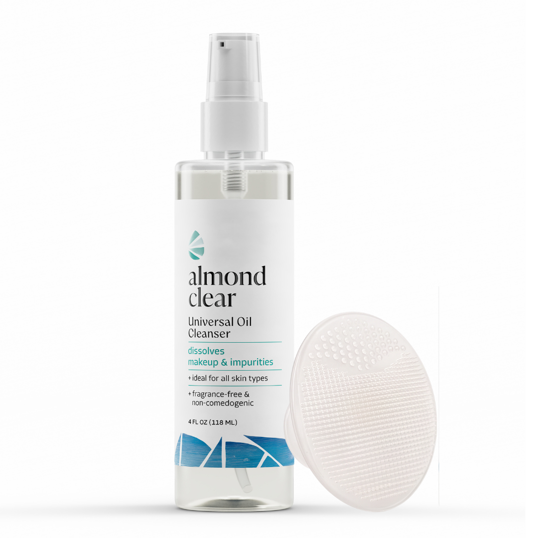 Almond Clear Universal Oil Cleanser in a 4 fl oz spray bottle, shown next to a clear silicone cleansing sponge on a white background.